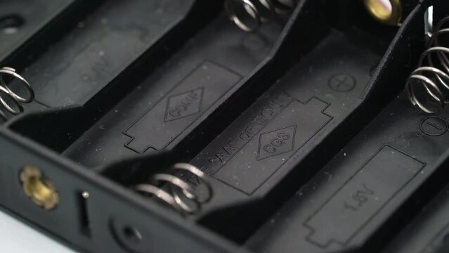 Battery connector box for AA AAA cells. Rotate at white isolated background.