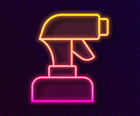 Glowing neon line Paint spray gun icon isolated on black background. Vector