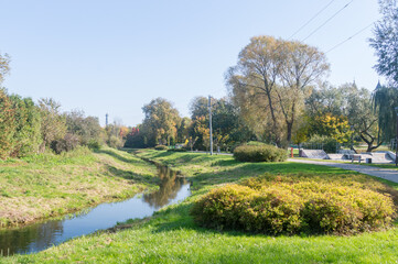 Fototapeta na wymiar River Jablonka in city park in Zambrow in Poland.