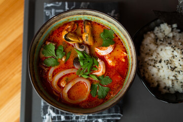 a large bowl of Asian soup in a restaurant 