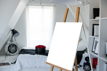 Easel with painting in artist's workshop