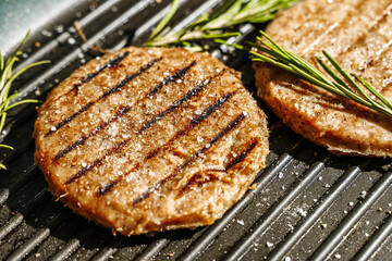 Veggie cutlet is grilled for veg burger. Vegetarian products from plant-based meat concept, beyond...