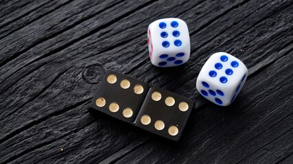dice on a wooden table