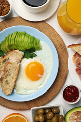 Concept of tasty breakfast on white background