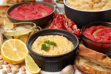 Concept of tasty food with hummus, close up