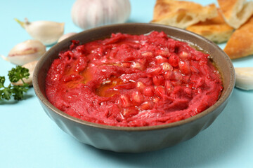 Concept of tasty food with beet hummus, close up