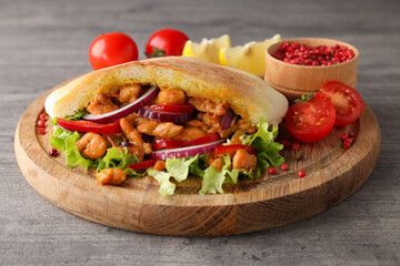 Concept of tasty food with pita with chicken, close up