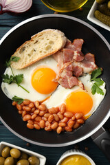 Concept of tasty breakfast on wooden background