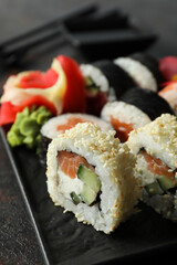 Concept of tasty food with sushi rolls, close up