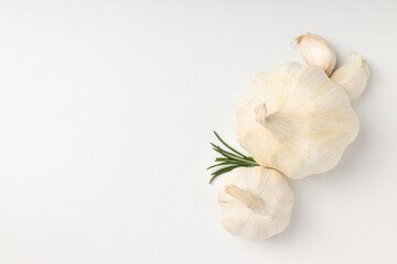 Garlic on white background, space for text