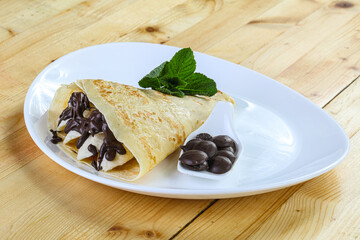 Pancake with banana and chocolate