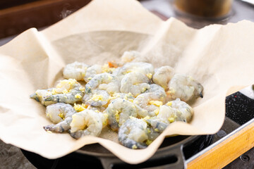 raw peel prawns in a white bowl without a marinate
