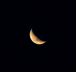 Fototapeta na wymiar Image of crescent moon with dark sky background.