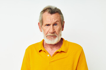 Obraz premium old man with a gray beard emotion gestures hands monochrome shot