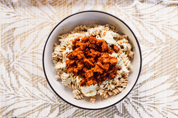 vvegan carbonara-inspired pasta with creamy cashew sauce and spicy tempeh bacon, healthy plant-based food