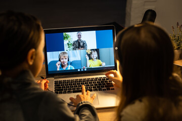 video conference call with pupil using webcam. Online education and e-learning concept. Home...