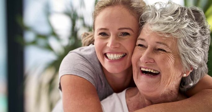 They always have a laugh together. 4k video footage of a smiling senior mother and her mature adult daughter.