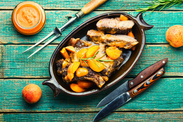 Veal steak fried with apricots