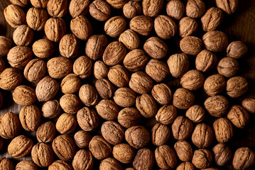 Several walnuts are on the table.