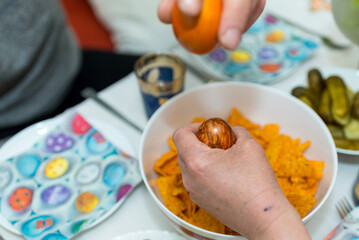 Hands Easter eggs knocking.Ready eggs tapping. Happy Easter.
