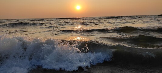 Evening sky on sea shore © JOMY