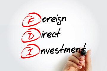 FDI - Foreign Direct Investment acronym with marker, business concept background