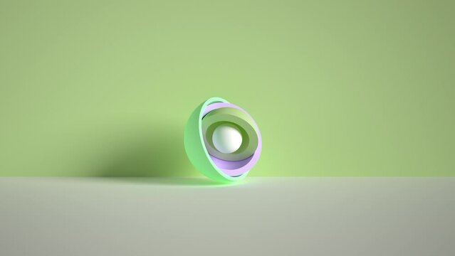 3d minimal motion design, ball hidden inside colorful hemispheres, layers opening. Simple geometric objects, primitive shapes isolated on green background. Live image, modern animated poster