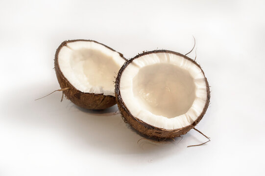 Fresh raw coconut isolated on white background. High resolution image