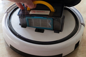 close-up of female sealing cardboard box with adhesive tape