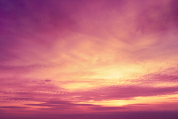 Naklejka na ściany i meble Colorful cloudy sky at sunset