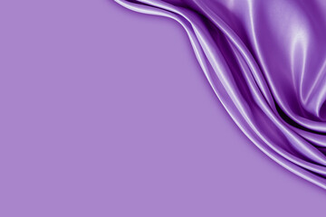 Beautiful elegant wavy violet purple satin silk luxury cloth fabric texture with monochrome...
