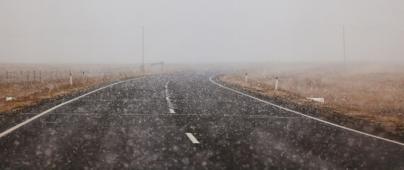 winter highway snowfall background fog poor visibility