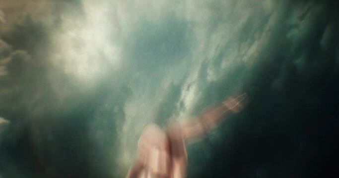 Animation of a shirtless flying man dives into the sky during a storm crushing into the ground.