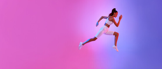 Fototapeta na wymiar Sporty Female Running In Mid-Air Exercising Over Neon Background, Panorama