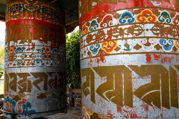 Vintage prayer wheels at the Khamsum Yeulley Namgyal Chorten pagoda in Punakha, Central Bhutan, Asia