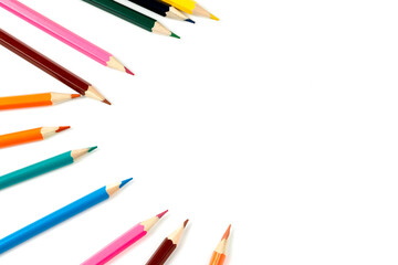 Colored pencils isolated on white background. close-up, copy space