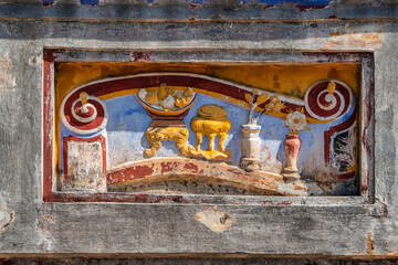 Decoration on gate of the Hien Lam Cac house in the Imperial City with the Purple Forbidden City...