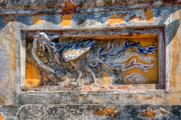 Decoration on gate of the Hien Lam Cac house in the Imperial City with the Purple Forbidden City within the Citadel in Hue, Vietnam. Imperial Royal Palace of Nguyen dynasty