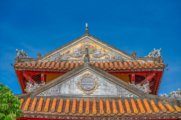 Fototapeta premium Decoration of the Hien Lam Cac house in the Imperial City with the Purple Forbidden City within the Citadel in Hue, Vietnam. Imperial Royal Palace of Nguyen dynasty