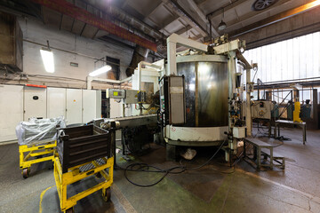 Photo of modern automatic automobile manufacturing workshop. Car production. Industrial scenery background