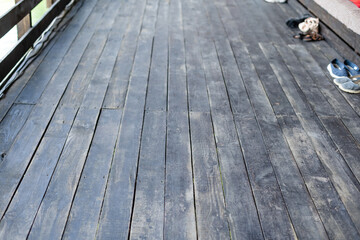 Wood background or dark brown texture. Texture of old wood use as natural background. Top view of brown black american walnut wood paneling. Copy space.