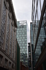 Looking up at buildings with a sky background. taken in Manchester England. 