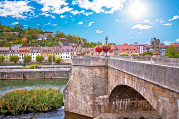 Old Main Bridge over the Main river and colorful  riverfront Town of Wurzburg view