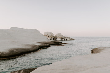 The sandstone white rocks cliffs moonscape of Sarakiniki volcanic beach in Milos Island Greece...