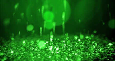 Beautiful green Sparkling Lights Festive background with texture.