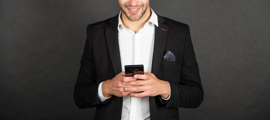 cropped guy in suit buy online on smartphone, shopping app