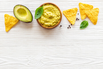 Guacamole sause with avocado and nachos chips