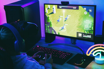Girl gamer playing strategy game online using virtual reality headset - Metaverse concept - Soft focus on right hand © DisobeyArt