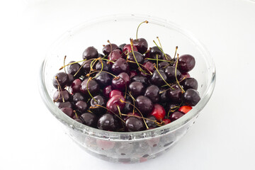 Fresh cherries on a white background