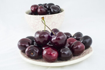 Fresh cherries on a white background